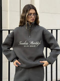 Damen nan oversized Halbzip-Sweatshirt mit hohem Stehkragen und Statement-Print