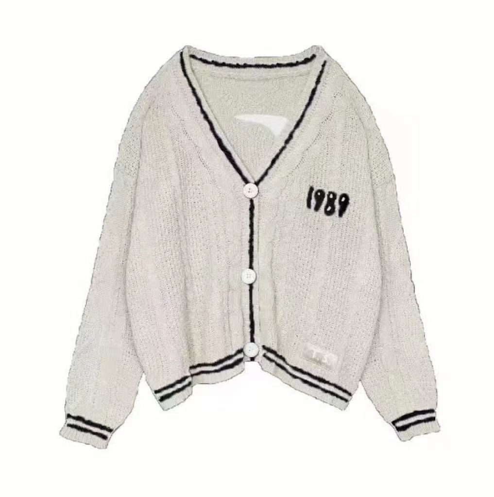 Damen nan kurz geschnittene Strickjacke mit V-Ausschnitt, Kontrastpaspel und oversized Ärmeln