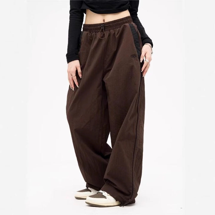 Damen nan weite Trackhose mit Kontrastpaspel, elastischem Bund und Oversize-Schnitt