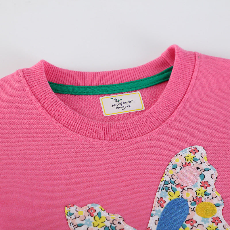 Mädchen Sweatshirt mit zauberhaftem Einhorn-Design und bunten Blumenapplikationen