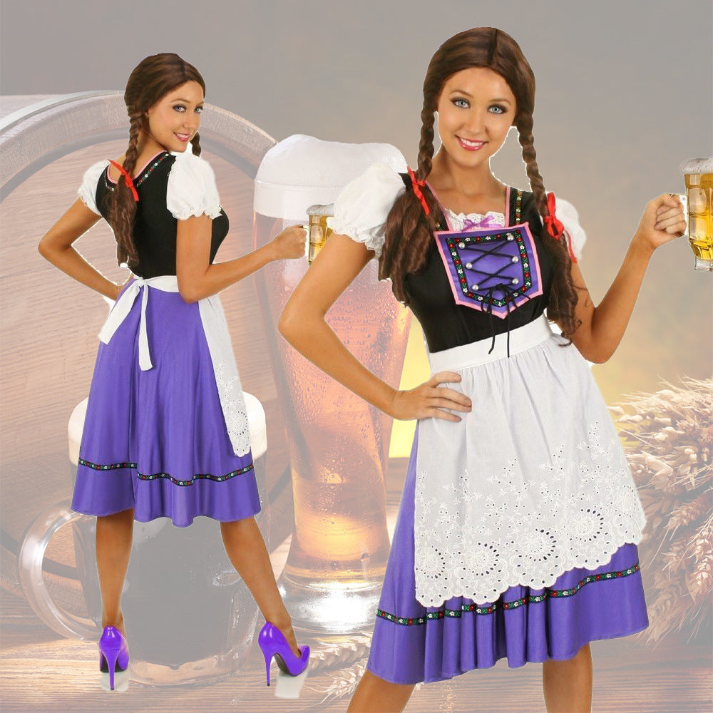 Damen nan Trachtenkleid mit geschnürter Miederblende und bestickter Schürze