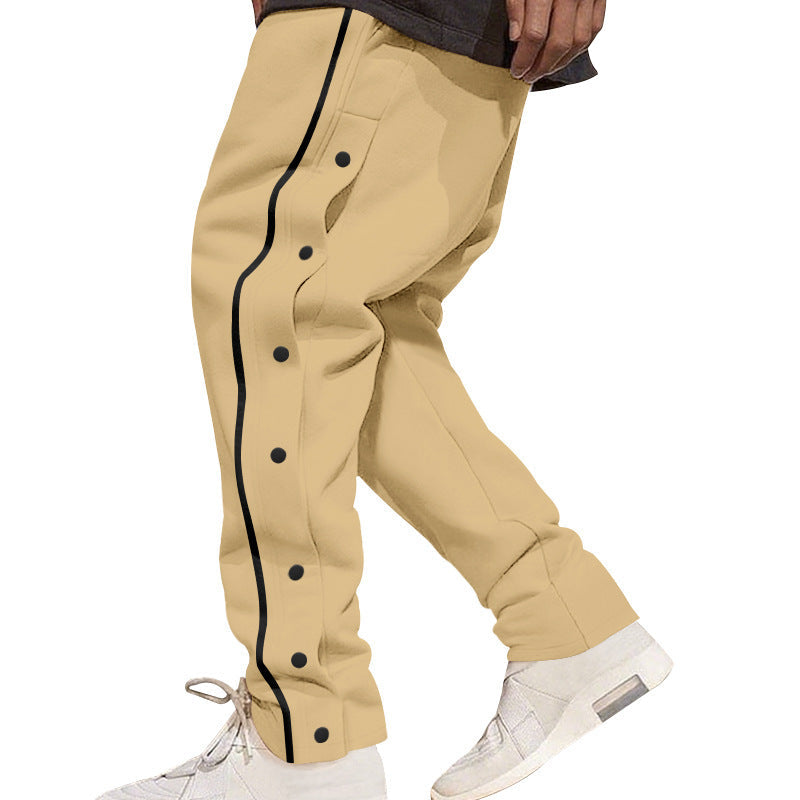 Herren nan weite Trackpants mit seitlicher Druckknopfleiste, elastischem Bund und reflektierendem Streamline-Streifen