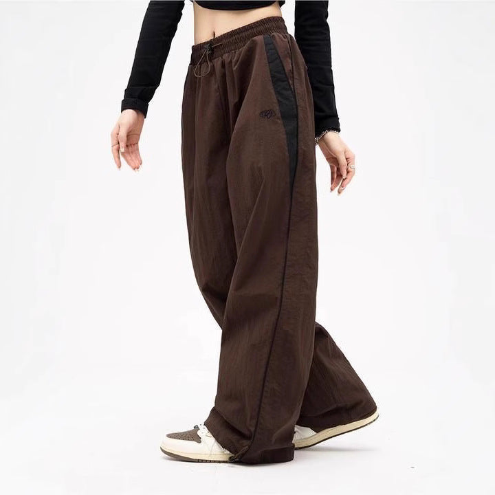 Damen nan weite Trackhose mit Kontrastpaspel, elastischem Bund und Oversize-Schnitt