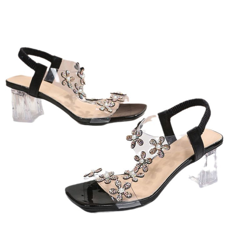 Damen Elegante Sandalen mit Blumenapplikationen und transparentem Absatz Selmira