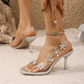 Damen Designer Sandalen mit transparentem Riemen und Blumendekor Selmira