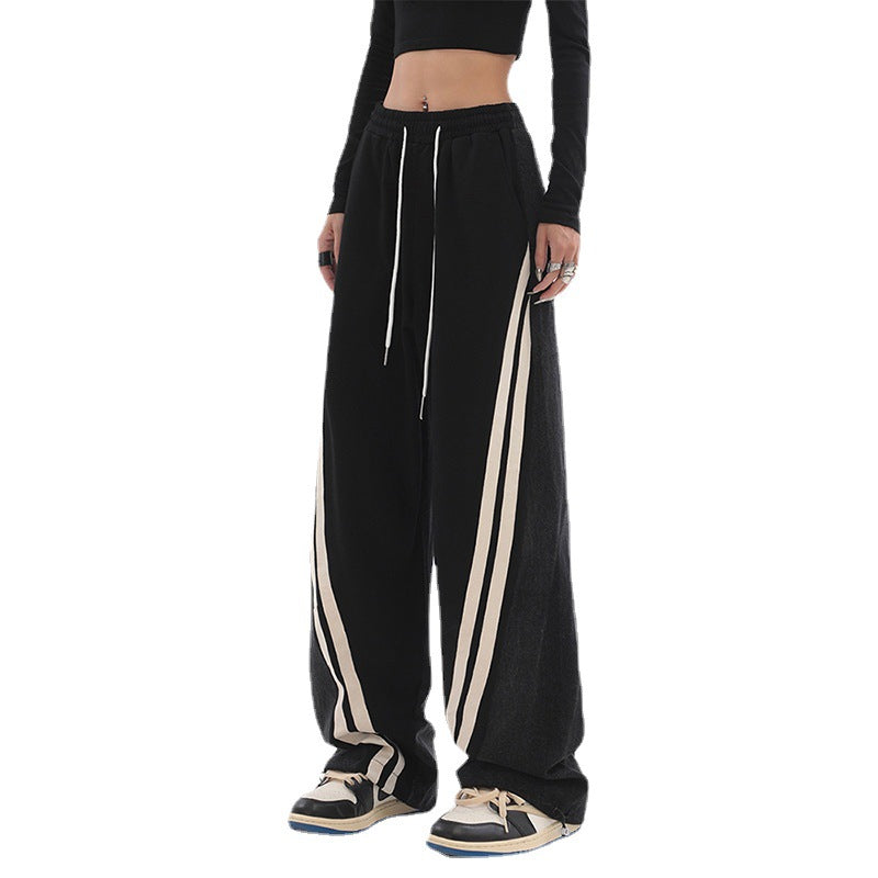 Damen nan weite Jogginghose mit hoher Taille und Jeansstoffeinsätzen sowie Seitenstreifen