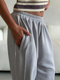 Damen nan weite Lounge-Jogginghose mit elastischem Komfortbund und seitlichen Eingrifftaschen